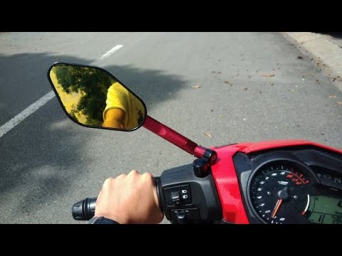 Xe may thieu kinh hau ben phai co bi phat khong - 4